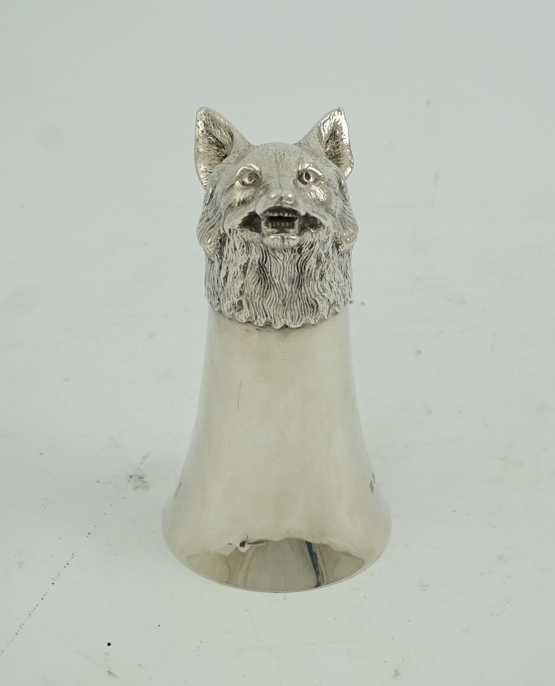 An Elizabeth II silver fox head stirrup cup, by William Comyns & Sons Ltd